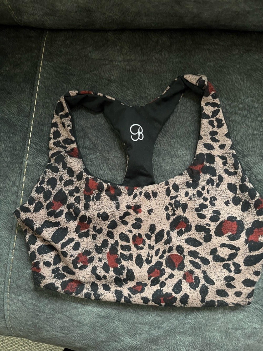Bombshell Sportswear Beige Leopard Print Sports Bra with Black & Red Spots